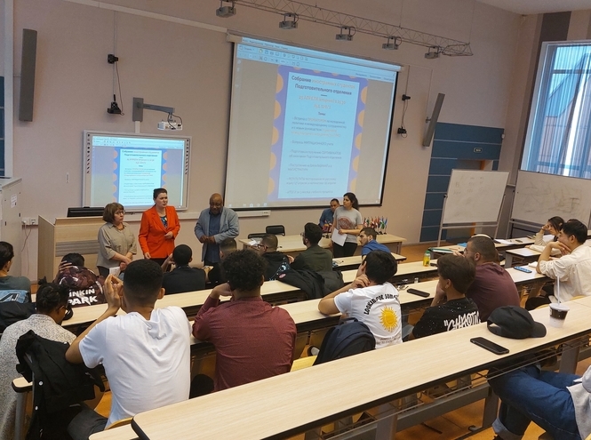 Foreign students at a meeting with the University administration