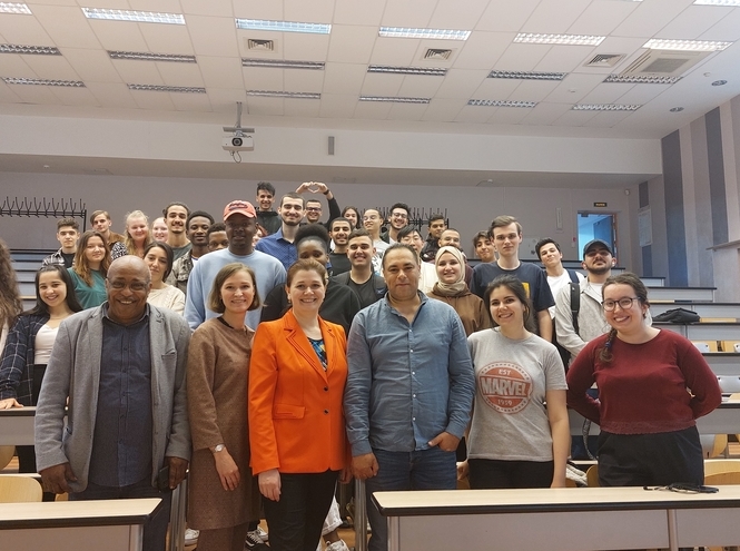 Foreign students at a meeting with the University administration